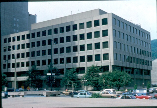 The Faculty of Management, once known as the School of Commerce, was originally located in the Arts Building. In 1942, John W. McConnell, a dedicated benefactor of McGill, Bought Purvis Hall, located on Pine near Peel Street, for the School of Commerce and the Faculty of Law. George H. Duggan donated his upper McTavish Street house to the University in 1944 and after 1946 it was occupied by the School of Commerce, yet the school was still short of space. Welcome relief came in 1964 when the Departments of Economics and Political Science moved into the newly erected Leacock Building, but the School of Commerce and the Graduate School of Business kept growing. In 1971, Samuel Bronfman, one of McGill's most loyal contributors, came to the rescue. He gave McGill an edifice, named in his honor, to house the newly opened Faculty of Management, formerly the School of Commerce. The site chosen for the Bronfman Building was at the northwest corner of Sherbrooke and McTavish, the location, until that time, of the Prince of Wales Terrace, one of the city's most prestigious set of row houses. Chadwick, Pope, and Edge, were the architects who designed the new six-storey structure, which rests solidly on a reinforced concrete frame. Identical, precast, concrete slabs are attached to the exterior, giving the facades a very regular appearance. To break this repetitive pattern, the ground floor is covered in striated concrete slabs and the second floor has only windows between the imposing columns. Overall, the exterior works well in combination with the McLennan Library, just across McTavish Street. The interior provided much needed classrooms, meeting rooms, offices, and a library for the Faculty of Management with space left over for the Departments of German, Hispanic, and Italian Studies. The Bronfman Building is expected to continue serving McGill well into the future.

In 1971, Samuel Bronfman, one of McGill's most loyal contributors, came to the rescue. He gave McGill an edifice, named in his honor, to house the newly opened Faculty of Management, formerly the School of Commerce. The site chosen for the Bronfman Building was at the northwest corner of Sherbrooke and McTavish, the location, until that time, of the Prince of Wales Terrace, one of the city's most prestigious set of row houses. Chadwick, Pope, and Edge, were the architects who designed the new six-storey structure, which rests solidly on a reinforced concrete frame. Identical, precast, concrete slabs are attached to the exterior, giving the facades a very regular appearance. To break this repetitive pattern, the ground floor is covered in striated concrete slabs and the second floor has only windows between the imposing columns. Overall, the exterior works well in combination with the McLennan Library, just across McTavish Street. The interior provided much needed classrooms, meeting rooms, offices, and a library for the Faculty of Management with space left over for the Departments of German, Hispanic, and Italian Studies. The Bronfman Building is expected to continue serving McGill well into the future.
