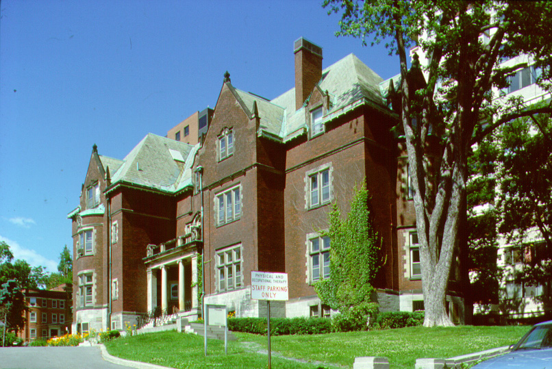In 1909, James T. Davis, a Square Mile entrepreneur, commissioned the renowned Canadian architects Edward and William Maxwell to design a mansion suitable for a man of his stature. The result was an Elizabethan Tudor style edifice of red brick on Drummond Street. This building, which features Dutch dormer windows, high gables, and steep roofs, shows the flexibility of the Beaux-arts trained architects. At the request of their patron, the Maxwells used a concealed steel and concrete frame to support the structure and supplied electric lighting to the house. The mansion has many interesting features, such as the dining room, which is a replica of a room in the Vatican, the Italian Renaissance style library, a seventeenth-century English dining room, and the chapel on the second floor.