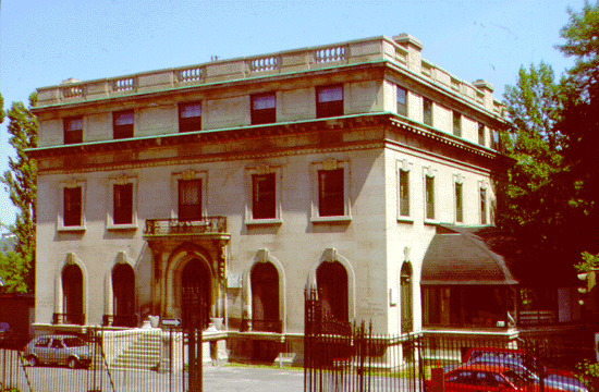 Purvis Hall was built in 1907 for Sir Mortimer B. Davis, founder of the Imperial Tobacco Company. He commissioned John McGregor and Robert Findlay, the designer of the Sun Life Building, for the project. This Classical, French Beaux Arts style mansion, constructed of Indiana limestone, has a symmetrical facade decorated with carved stone and intricate iron work beneath which it conceals an innovative steel frame and reinforced concrete floors. Each floor was planned around a central hall and was as decorative as the exterior, but with more of a sense of warmth. It featured such details as carved stair rails and chandeliers, custom made furniture, and a beautiful botanical conservatory enclosed in glass, a popular feature of Square Mile houses.

In 1935, the industrialist Arthur B. Purvis bought the house and remodeled it. He had several ornate ceilings and a Renaissance-style fireplace removed. After Purvis died in an air crash in 1941, the house was bestowed upon McGill in his memory by John W. McConnell, a major benefactor of the University. Findlay was again hired, this time to renovate the house, now called Purvis Hall, for academic use while preserving as much of its original detail and charm as possible. The upper floors were converted into office and classroom spaces, the ground floor became a reading room, and the basement was transformed into stacks. The School of Commerce (now the Faculty of Management) occupied Purvis Hall until 1973, at which point it was given to the McGill University Press and the Arctic Institute. Today it is designated for use by the Department of Epidemiology and Biostatistics and still retains much of its original decor.