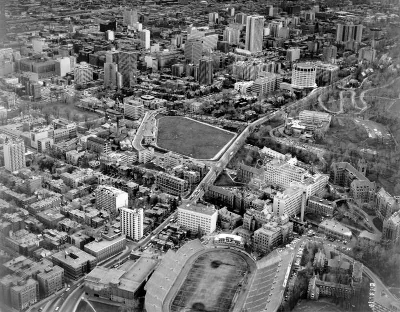 Aerial view looking west past the Stadium and the McIntyre Medical Sciences Building (1960)