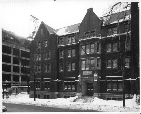 The Wesleyan Theological College was built on the northwest corner of University and Milton Streets in 1913-14 by the firm Ross and Macdonald, replacing an earlier building dating from 1866. Its purpose was to house the students of the College and provide classroom space for them. The College, renamed the United Theological College in 1929, was one of many theological schools once associated with McGill. In 1945, the United Theological College sold its building to McGill for one dollar and the building was renamed Wilson Hall after Morris Wilson, once a chancellor of the University. At this time, just after World War II, McGill required significantly more residence space and Wilson Hall was suited to this purpose. In 1962, this gabled, brick structure was transformed into the Schools of Nursing and Social Work and still serves this function today.