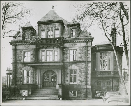 In 1892, James Ross commissioned Bruce Price, a renowned American architect, who also designed McGill's Royal Victoria College and the Chateau Frontenac in Quebec City, to build a house for him on Peel Street on the Square Mile. Ross was an entrepreneur of the Canadian Pacific Railroad, whose interests included yachting and collecting masterpieces. As such, he was the commander of the St. Lawrence Yacht Club and, later in his life, helped to create the Montreal Museum of Fine Arts. The house, with its two circular turrets and larger central tower, was constructed of Credit Valley limestone and was designed in the French Chateau style. Between 1897 and 1912, Edward and William Maxwell, a pair of well-known Montreal architects, were commissioned to redesign and expand parts of Price's original work. Part of this work involved adding to the mansion an art gallery wing, a breakfast room and bedroom, and several wrought iron and carved details. In 1913, James Ross died and his son, J.K.L. Ross inherited the house and a considerable fortune. He hired the firm of Trowbridge and Livingston to expand and remodel his late father's home, giving it a more austere, Classical appearance. In 1935, having spent all of his fortune on parties, horse racing, and yachts, J.K.L. Ross went bankrupt and the house was sold for a mere $51,000.

John W. McConnell bought the Ross Mansion in 1948 as a gift to McGill. At this time, it was renamed Chancellor Day Hall, after one of the University's first Chancellors, and was given to the Faculty of Law, which still occupies it today. In 1966, the firm of Bland and Lemoyne erected a six-storey, precast concrete tower just west of Chancellor Day Hall and connected to it by a corridor. This extension, which blends with the adjacent Stewart Biological Sciences Building, provided more classrooms and library space.