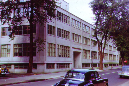 The Frank Dawson Adams Building, named after a professor of Geology who also served as Vice Principal from 1920 to 1924 and became the first chairman of Graduate Studies, was originally named the Physical Sciences Centre. It was finished in October, 1951 by the firm of Fleming and Smith who were later commissioned by McGill to build both the McConnell Engineering and the Otto Maass Chemistry Buildings. The space was originally intended for Mining, Metallurgical, and Chemical Engineering and Geology, allowing Physics and Chemistry to remain in the Macdonald Physics and Macdonald Chemistry Buildings, respectively. This structure, connected to the campus by a small bridge, provides a link between Macdonald Physics and Macdonald Chemistry (now the Macdonald-Stewart Library Building and the Macdonald-Harrington Building, respectively) and then stretches north along University Street. All four floors (the fourth was added in 1963) were erected around a steel frame and the materials chosen are durable and of good quality. F. D. Adams has large windows which allow much natural light at the west and east ends and provide a view of the opposite side of campus. There is a large lecture theatre on the second and third floors which can accomodate 350 science students, allowing the lectures to be given in just one section. The Department of Geology, having been moved from the fifth floor of Macdonald Chemistry, is located on the second through fourth floors with several Engineering faculties sharing the main and basement areas. As with many designs of this period, the F. D. Adams Building is very functional; it's only ornament is the structure itself.