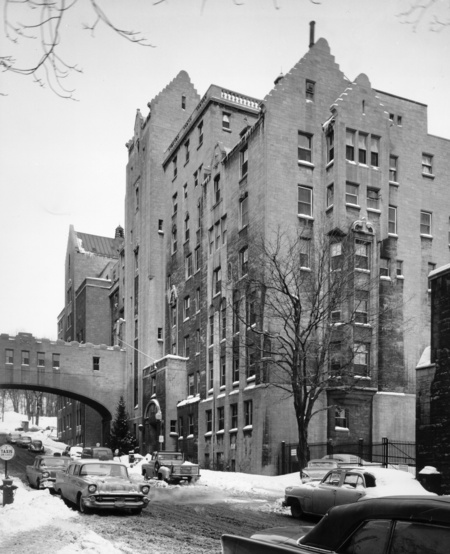 In 1932, the Montreal Neurological Institute was constructed just north of the Pathological Institute by the firm of Ross and Macdonald, who also designed the Old Biology Building. This structure, considered a part of the Royal Victoria Hospital complex, continues the ideas of the Hospital's architecture and is on the same scale. It was expanded in 1945 by the firm of Fetherstonhaugh, Durnford, and Bolton, who were responsible for several other projects on the McGill campus such as Douglas Hall.